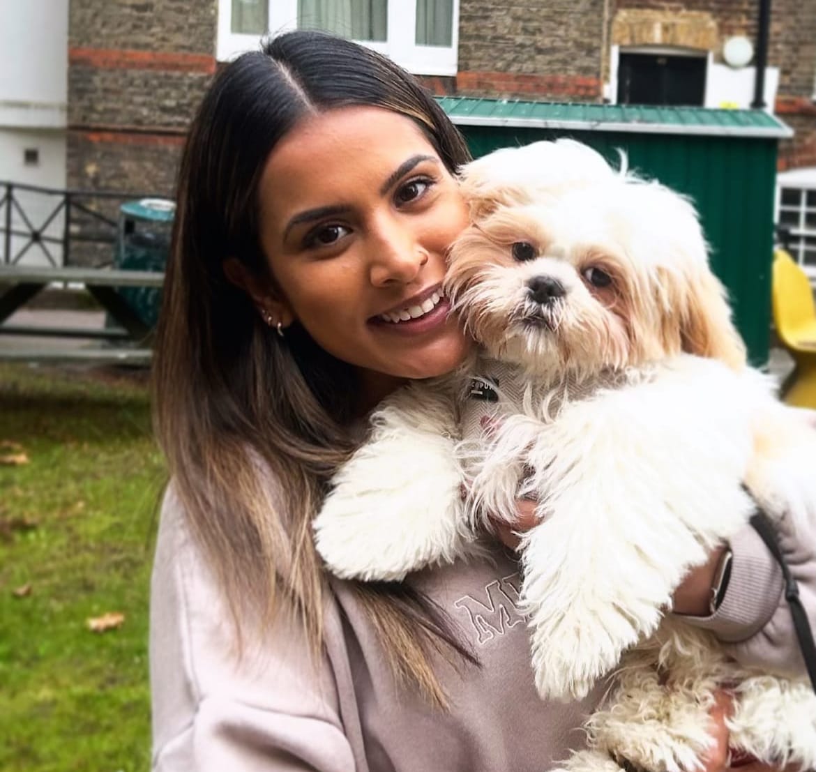 shivani holding up a dog